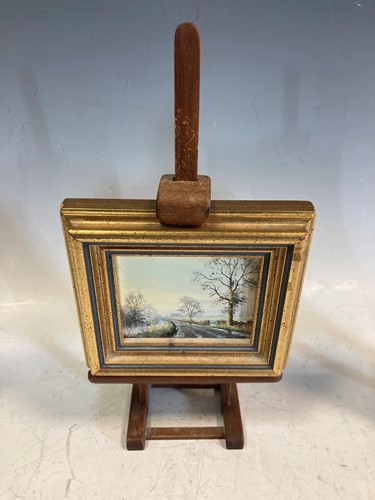 Lot 44 - Two small modern cut paper silhouette pictures...