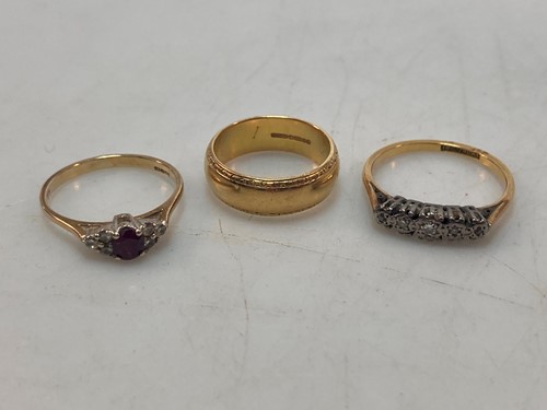 Lot 150 - A hallmarked 18ct gold wedding band, together...