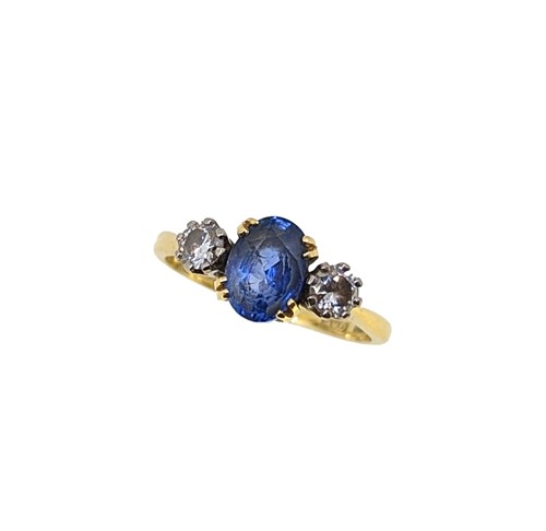 Lot 186 - An 18ct gold sapphire and diamond ring