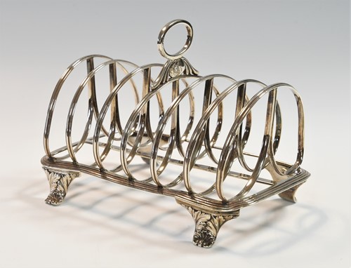 Lot 528 - A George IV silver 7 bar toast rack