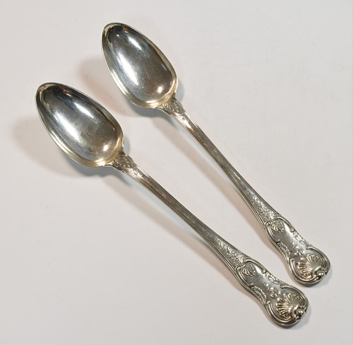 Lot 511 - A pair of George III silver basting spoons