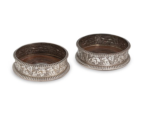 Lot 666 - Glasgow - A pair of George IV silver bottle coasters