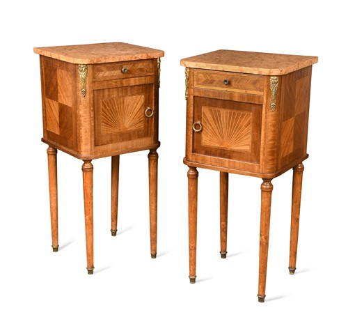 Lot 525 - A pair of Louis XVI style gilt-metal mounted bedside cabinets