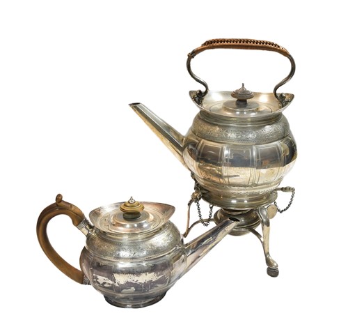 Lot 514 - A George III silver teapot with a later spirit kettle and stand en suite