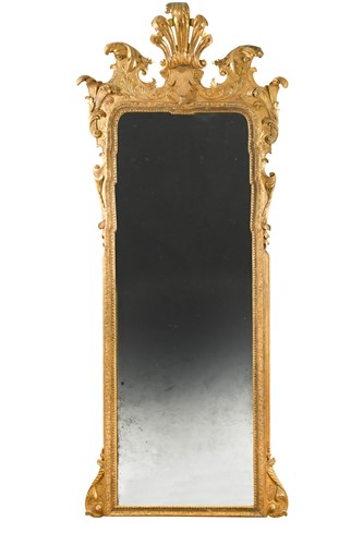 Lot 451 - A George I giltwood pier mirror