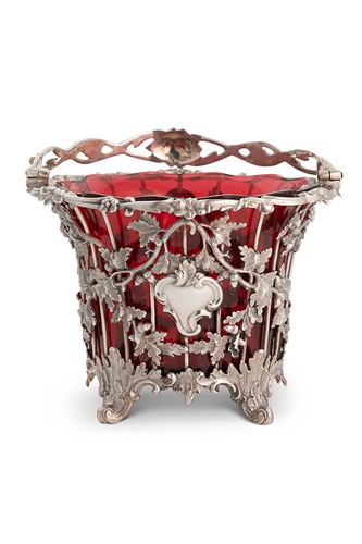 Lot 563 - A Victorian silver swing handled sugar basket