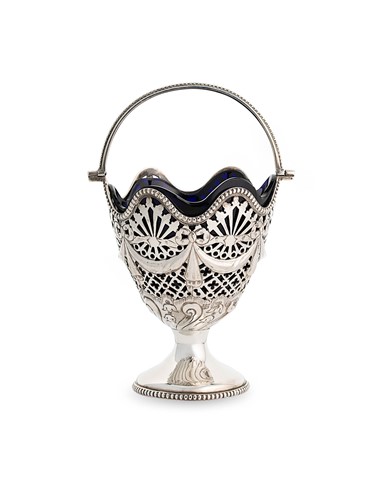 Lot 537 - A Victorian silver swing handled sugar basket