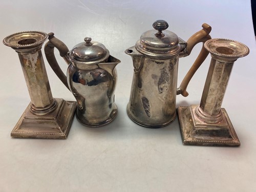 Lot 198 - Two silver hot water jugs together with a pair...