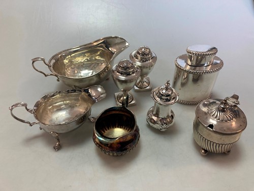 Lot 190 - A pair of silver pepperettes and a single...