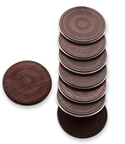 Lot 437 - Martyn Pugh - A set of eight silver and recycled rosewood bottle coasters