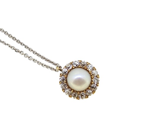 Lot 194 - A pearl and diamond pendant and chain