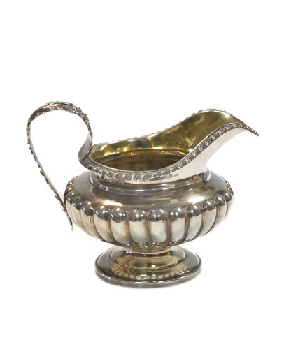 Lot 545 - A Victorian silver cream jug, mark of Charles Fox II