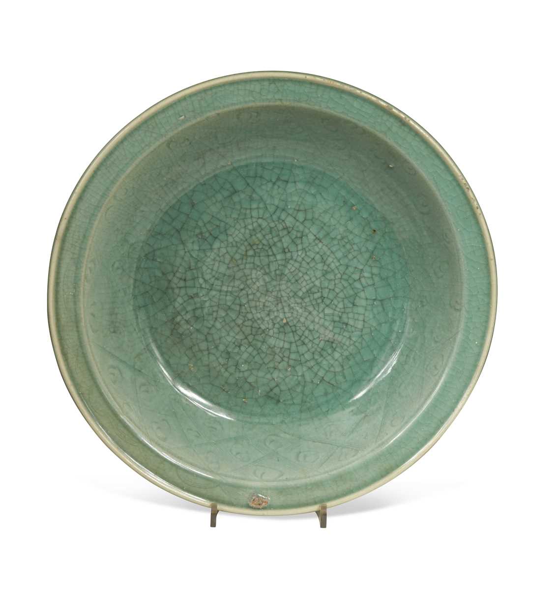 Lot 56 - A Chinese Longquan celadon dish, Ming Dynasty (1368-1644)