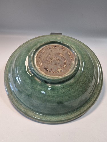 Lot 56 - A Chinese Longquan celadon dish, Ming Dynasty (1368-1644)