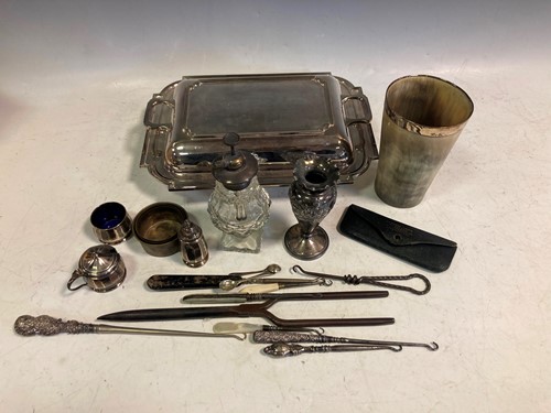 Lot 208 - A silver cruet set, a silver topped glass...