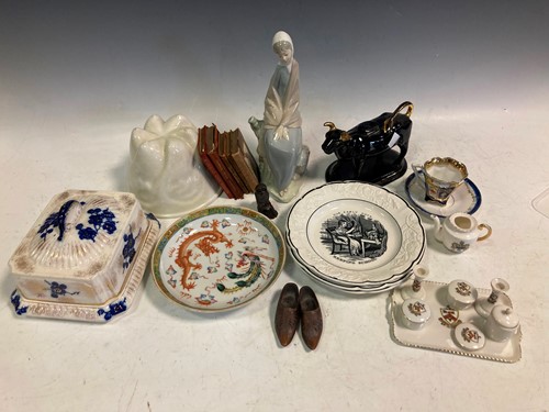 Lot 26 - A Chinese porcelain dragon decorated saucer...