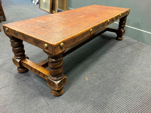 Lot 381 - Leather barely twist coffee table 40 x 131 x 51cm