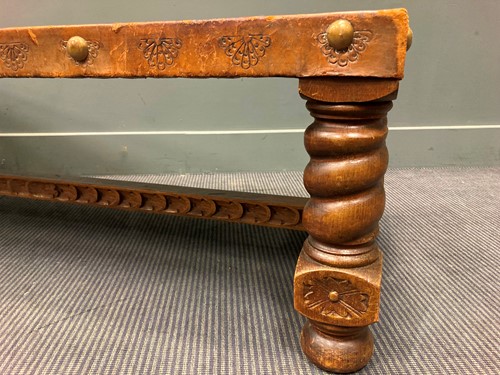 Lot 381 - Leather barely twist coffee table 40 x 131 x 51cm