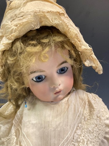 Lot 58 - A Victorian style Bru bisque head doll by Gina...