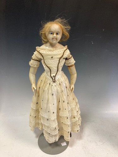 Lot 59 - A 19th century wax shoulder head doll with...