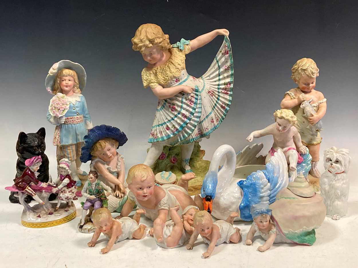 Lot 51 - A large group of figural ceramics to include a...