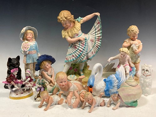 Lot 51 - A large group of figural ceramics to include a...