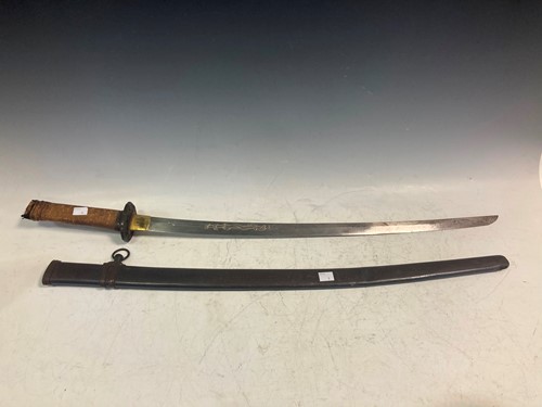 Lot 86 - A 20th century Japanese sword, original...