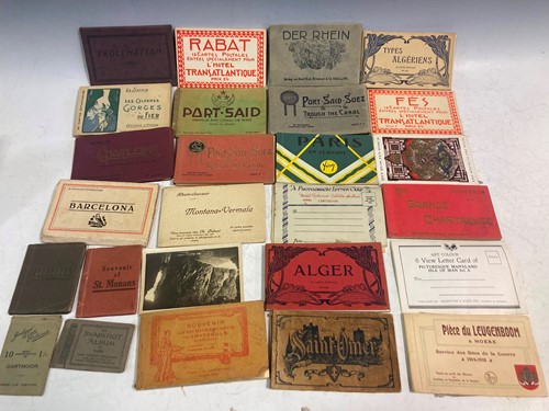 Lot 94 - Five boxes of postcards, including various...