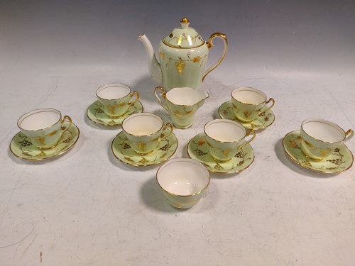 Lot 118 - A Royal Crown pottery Trentham coffee service,...