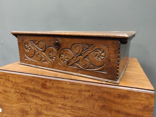 Lot 298 - An 18th century oak bible box, the hinged top...