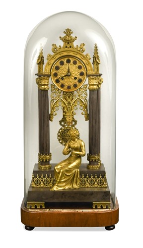 Lot 685 - An ormolu and silvered mantel clock in the decorated gothic style, 19th century
