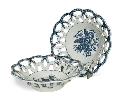 Lot 574 - A pair of Worcester blue and white circular baskets, circa 1775