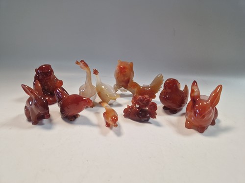 Lot 76 - A collection of seventeen Chinese carved agate animals