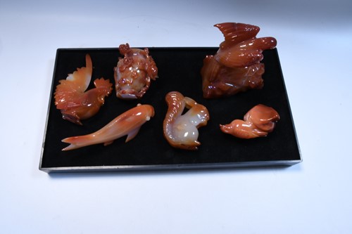 Lot 76 - A collection of seventeen Chinese carved agate animals