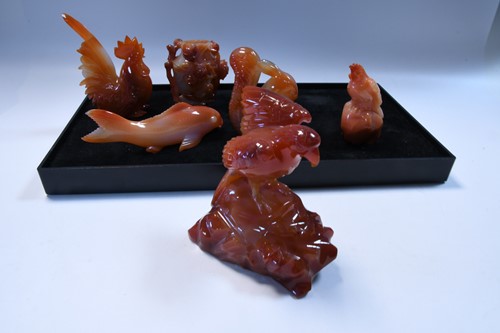 Lot 76 - A collection of seventeen Chinese carved agate animals