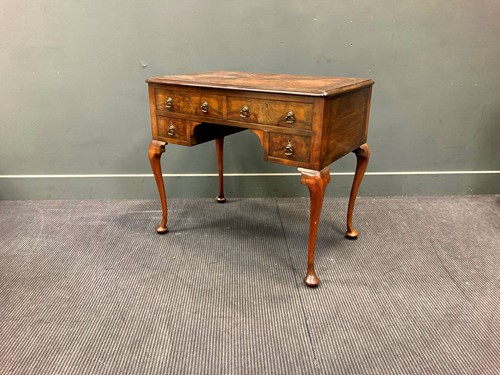 Lot 492 - A Queen Anne revival walnut dressing table...