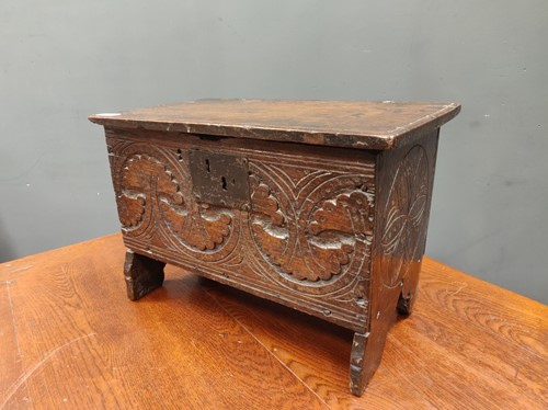 Lot 612 - A small 19th century carved oak chest, 33 x 50...