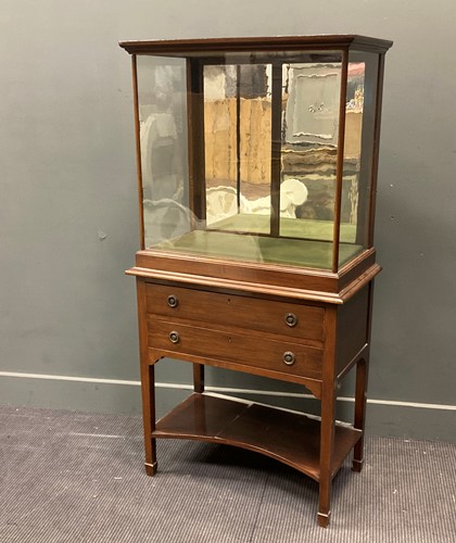 Lot 594 - An Edwardian display cabinet on tapering legs,...