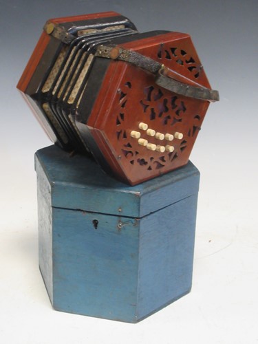 Lot 127 - A mahogany 21 key concertina with box, 19th...