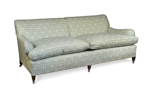 Lot 795 - A Howard style three seater sofa, 20th century