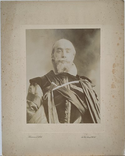 Lot 300 - A collection of 12 photographs and a glass...