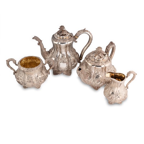 Lot 400 - A Victorian silver three-piece tea set with one addition