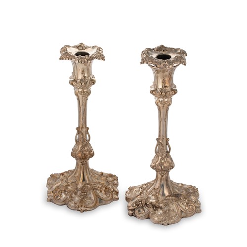 Lot 315 - A pair of (probably) late 19th century silver plated candlesticks