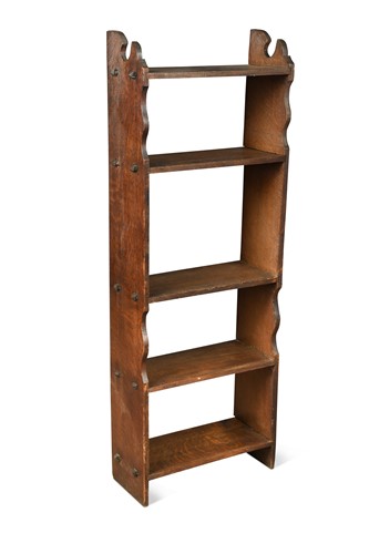 Lot 159 - A narrow Arts & Crafts oak bookcase