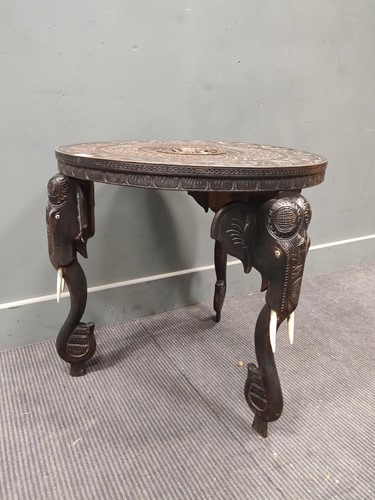 Lot 535 - An Indian hardwood circular coffee table with...