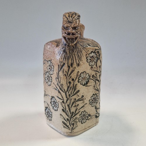 Lot 38 - Robert Wallace Martin for the Martin Brothers, a small salt-glazed stoneware ewer