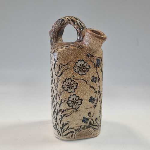 Lot 38 - Robert Wallace Martin for the Martin Brothers, a small salt-glazed stoneware ewer