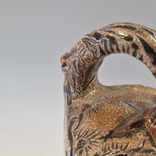 Lot 38 - Robert Wallace Martin for the Martin Brothers, a small salt-glazed stoneware ewer