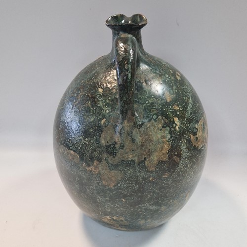 Lot 37 - Robert Wallace Martin for the Martin Brothers, a large bellied jug, circa 1896