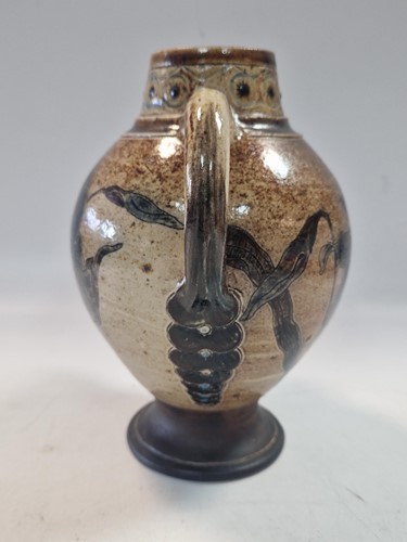 Lot 44 - Robert Wallace Martin for the Martin Brothers, a twin-handled stoneware vase